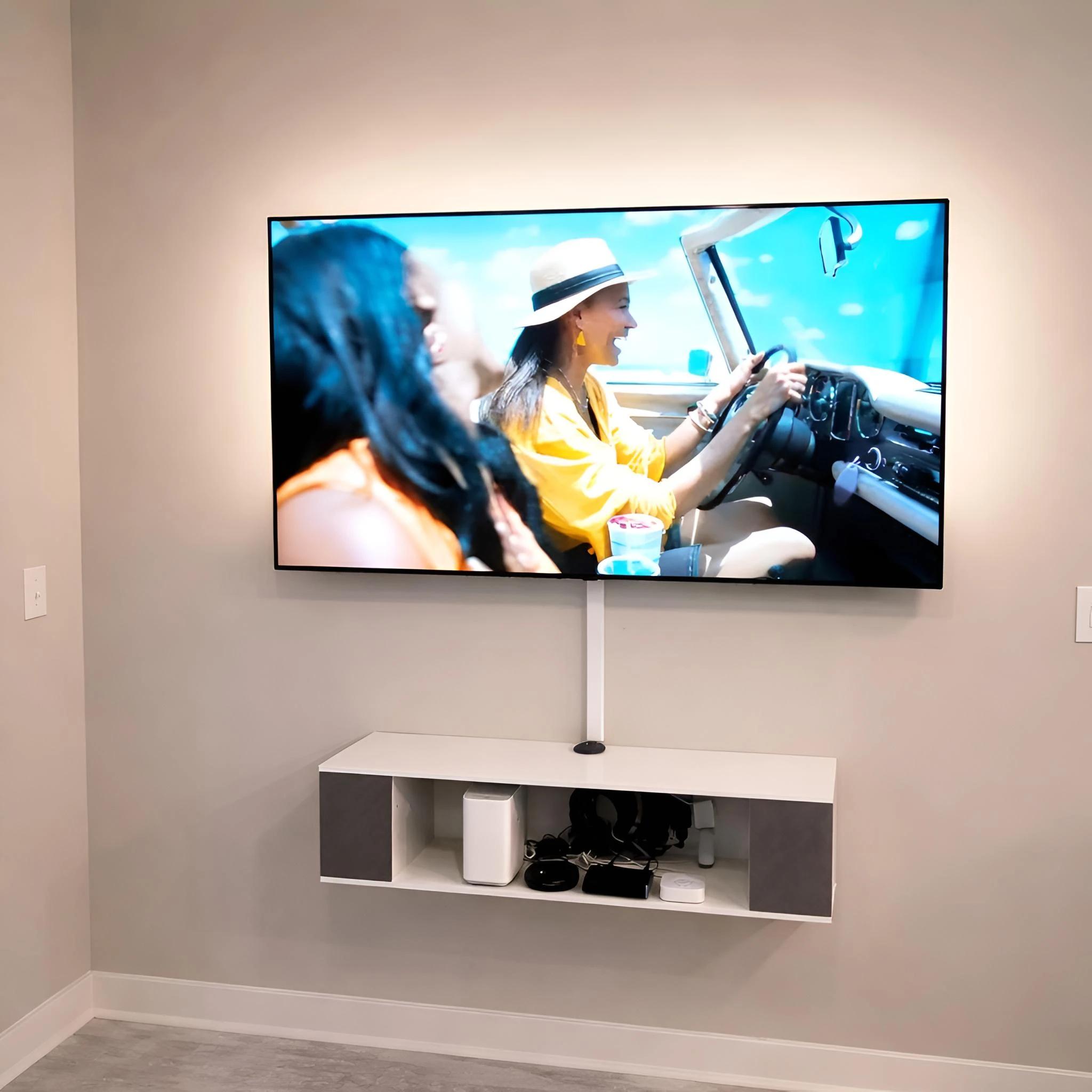 Floating TV mount installation with clean setup