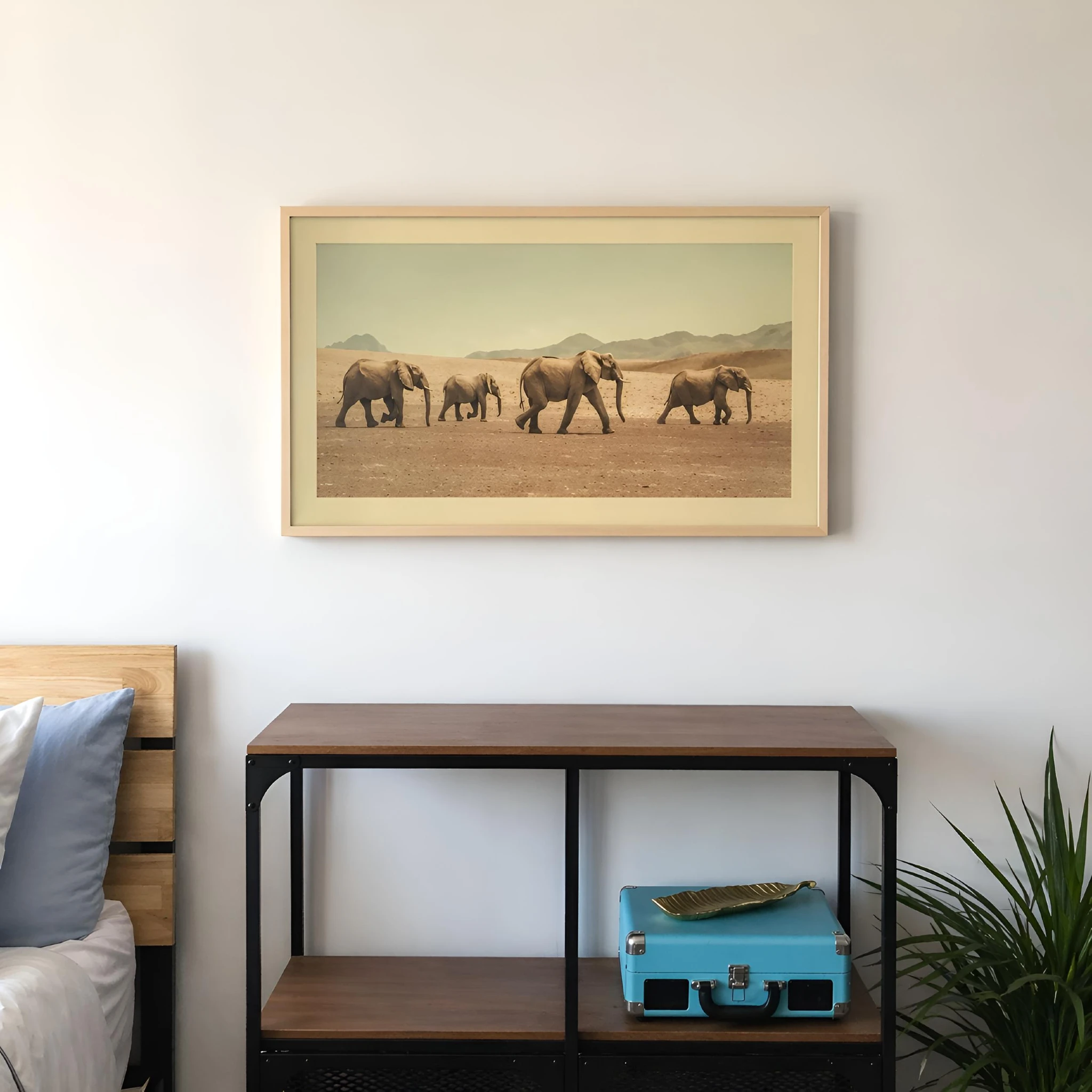 Samsung Frame TV in a bedroom with art display mode