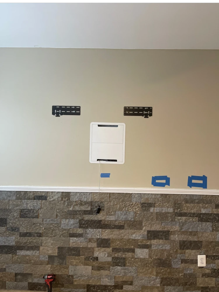 Samsung Frame TV media box cover installed before the TV is mounted
