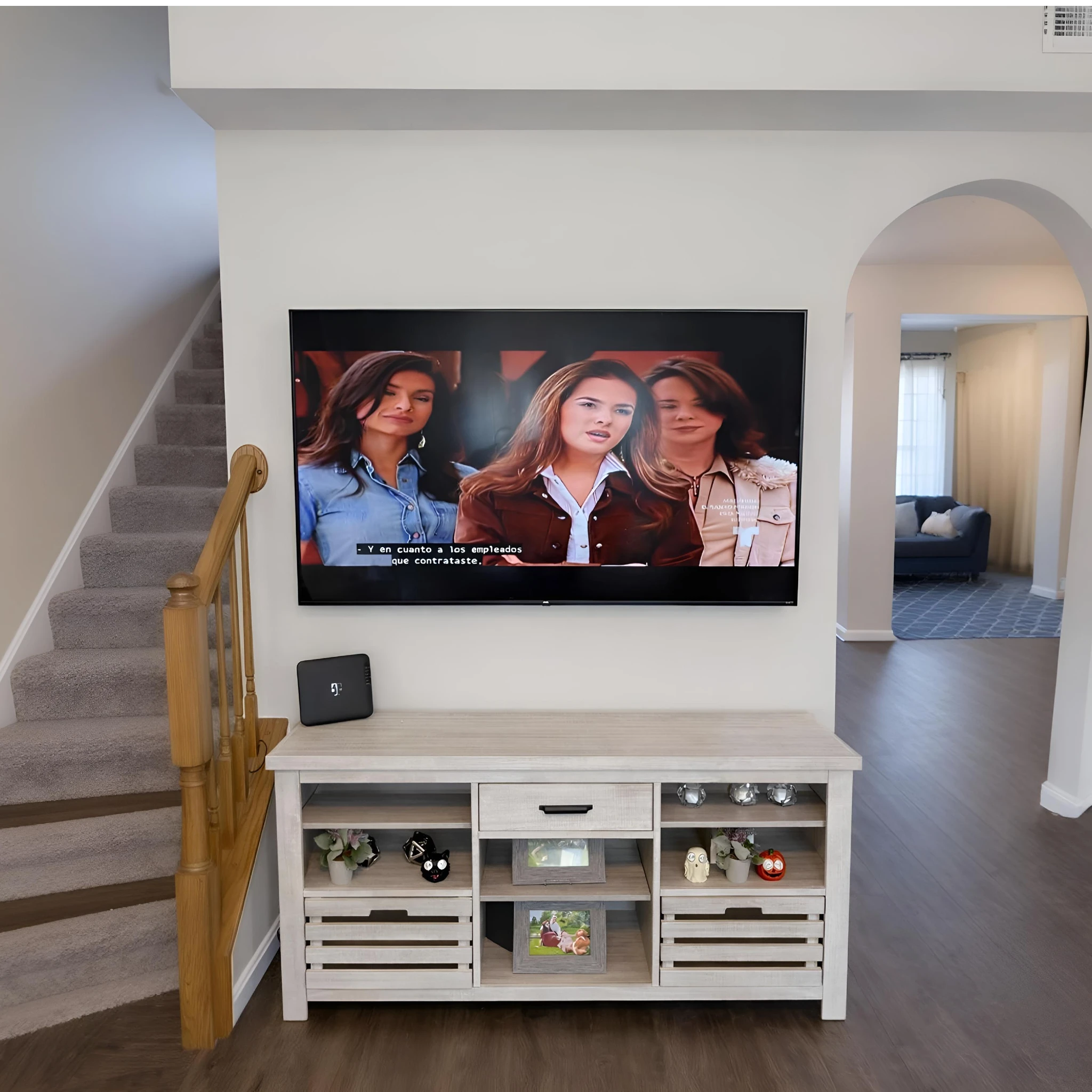 Clean living room TV wall mount installation for an apartment-style setup