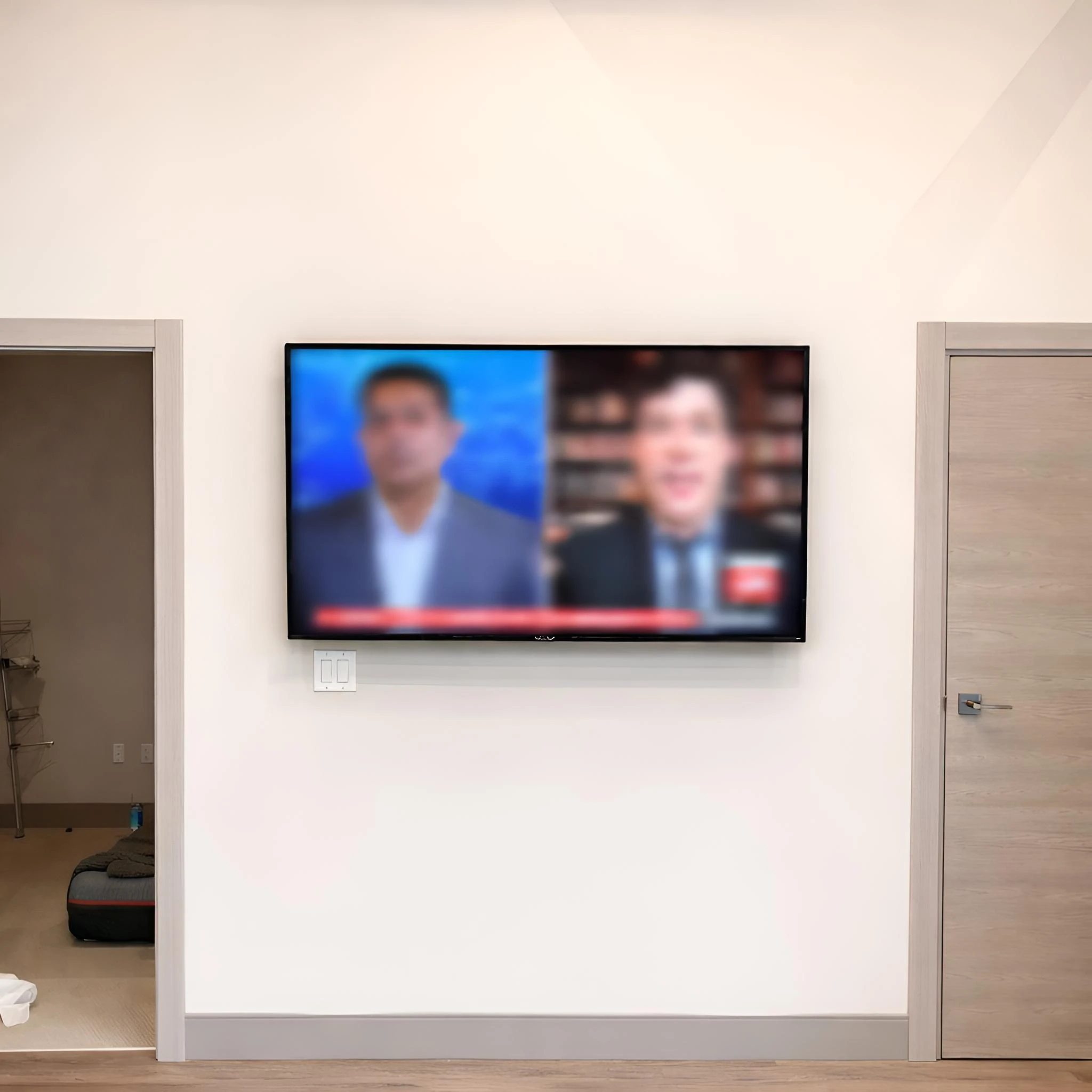 TV wall mounting with in-wall wire concealment