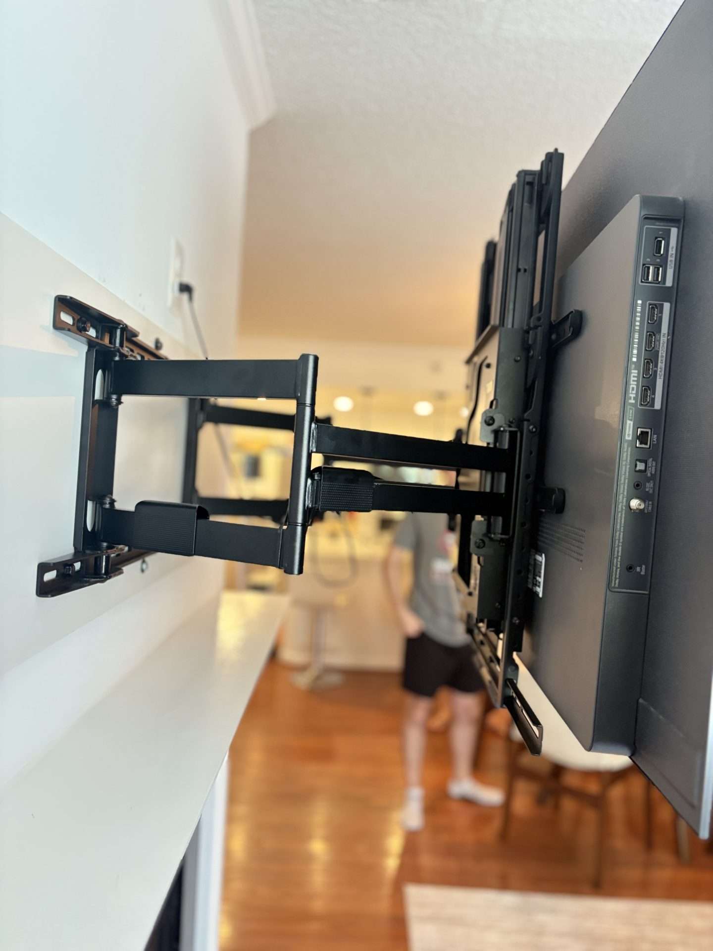 Full-motion TV mount installed for flexible viewing